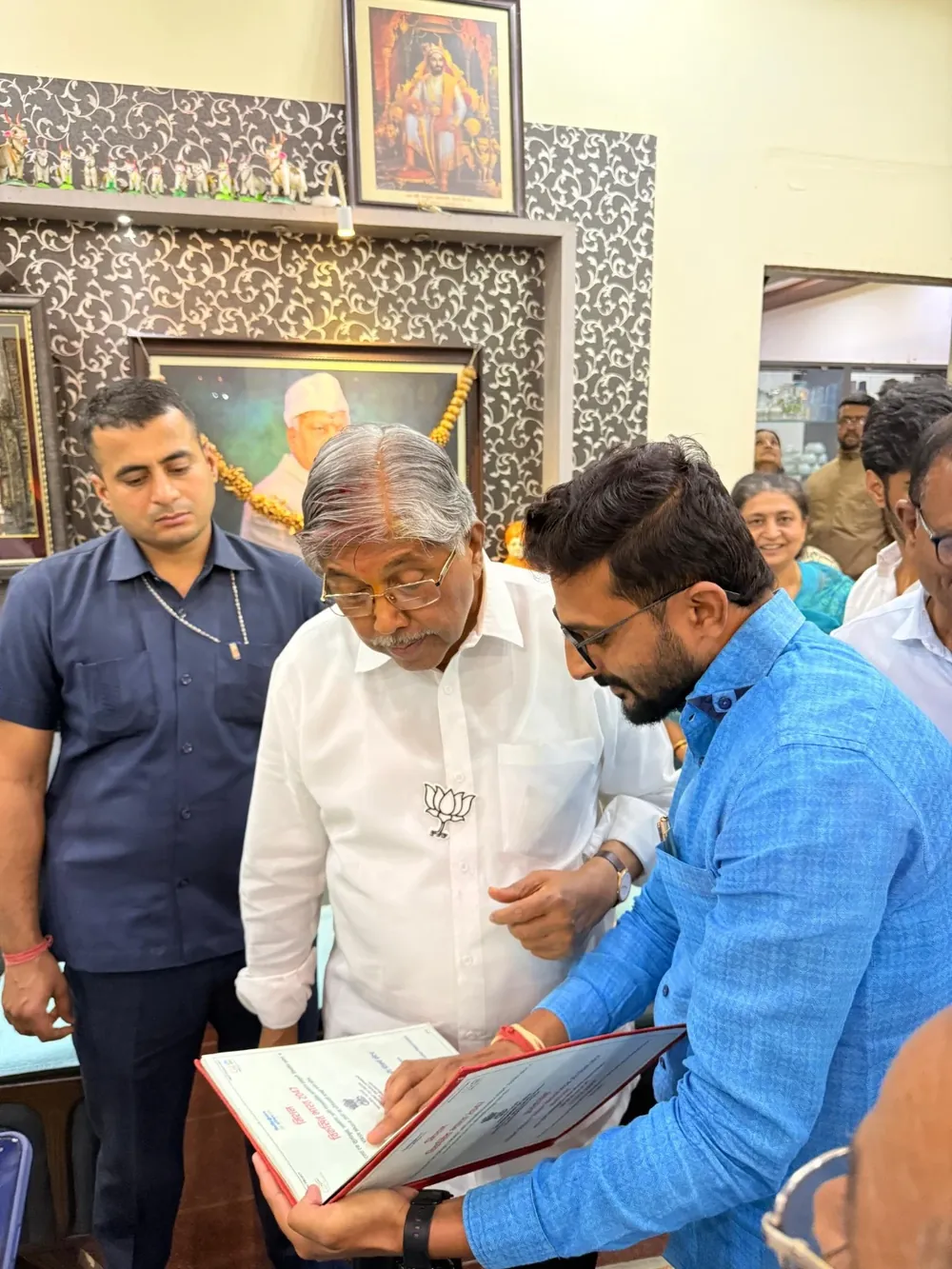 Shri Chandrakant (Dada) Patil reviewing Phoenix Computer's curriculum